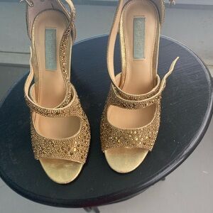 Beautiful gold embellished heels.